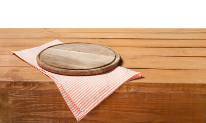 Wooden board stand on tablecloth over grunge background