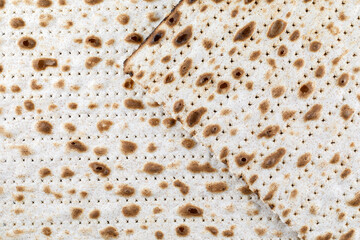 Matzah. Jewish traditional Passover bread. Pesach celebration symbol. Close-up.