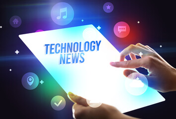 Holding futuristic tablet, new media concept