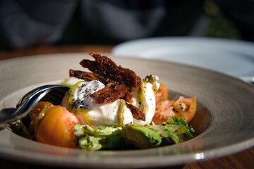Fresh salad with italian cheese and organic vegetables.