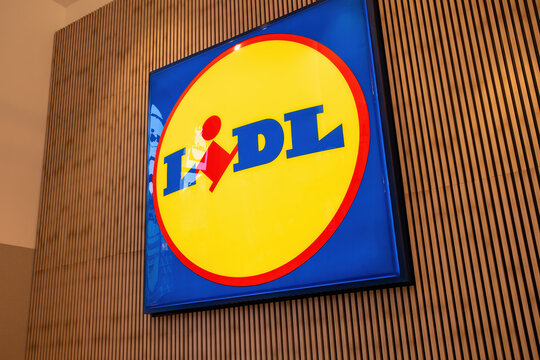 Prague, Czech February 2023. Lidl logo at supermarket building wall. German international discount supermarket retail chain. High quality photo