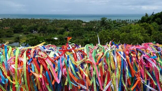 View from the colored ribbons of Nossa Senhora d'Ajuda at the Belvedere of Arraial d'Ajuda to the Praia dos Pescadores beach. Tourist destination of Bahia state, Brazil.