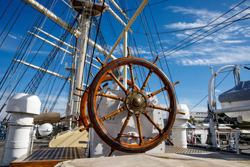 The wooden helm of a sailing ship. © 9parusnikov