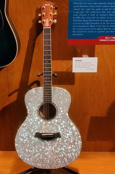 Nashville, Tennessee, U.S - June 26, 2022 - The rhinestones encrusted guitar owned by Taylor Swift