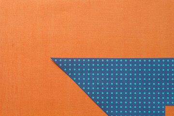 cut scrapbook paper shape (triangle or arrow or edge or corner or cliff) on orange