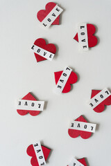 Fototapeta na wymiar red hearts and the word love