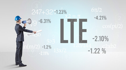 Engineer in hard hat with abbreviation