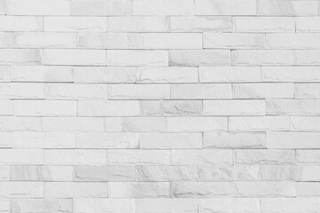 White brick wall texture background for stone tile block painted in grey light color wallpaper modern room backdrop design.	