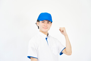 ガッツポーズする引越し業者の男性　白背景