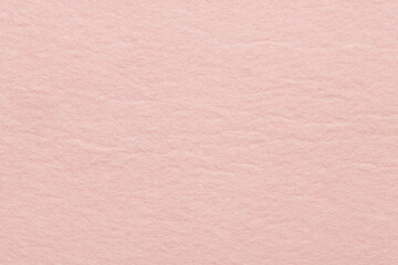 Soft felt textile material Tender Peach colors, colorful texture flap fabric background closeup