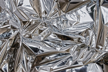 Shiny silver foil close-up. Abstract background
