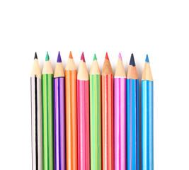 Set of color pencils isolated on white background, closeup