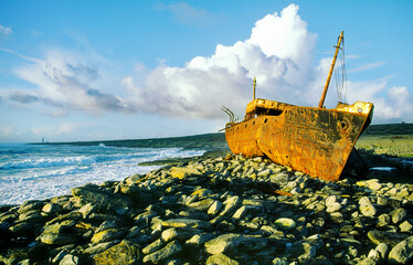 The wreck of the freighter Plessey high on the rocky shore of Inisheer, smallest of the Aran...