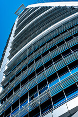 Glass facade of modern office building. Glass facade of modern office building. Doha business district. Business, economy and finances concept.