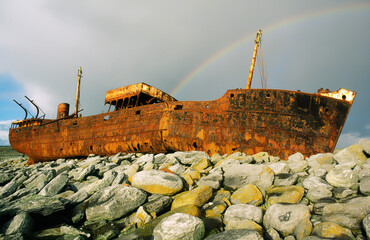 The wreck of the freighter Plessey high on the rocky shore of Inisheer, smallest of the Aran...