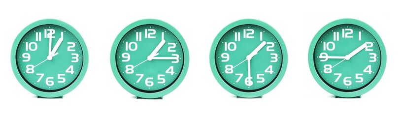 close up of a set of green clocks showing the time; 1, 1.15, 1.30 and 1.45 p.m or a.m. Isolated on white background - obrazy, fototapety, plakaty