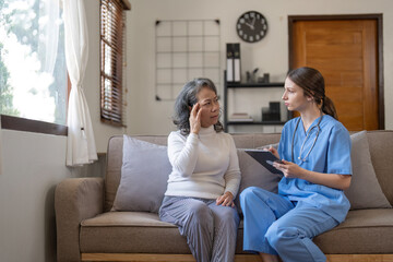 Doctors or nurse talking to explain medication and health care to elderly patients, elderly people...