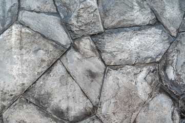 Ashlar old stone wall texture background. masonry stone wall rock construction pattern