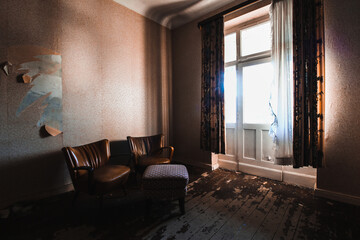 interior of an abandoned hotel room in a lost place