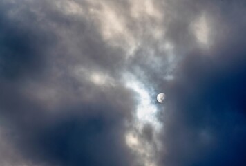 Fototapeta premium The sun is visible through the winter clouds