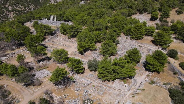 View of historical ruins, columns, ancient theater and temples in the ancient city of Priene.