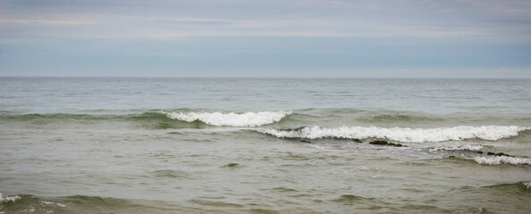 View on beach and sea with waves. Travel concept. Summertime