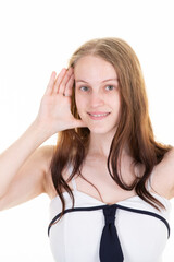 young happy woman with her hand on the side of her face so as not to see on white background looking camera