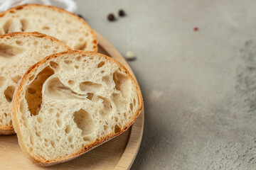 Sliced bread Ciabatta. Organic bread baked at home. Healthy food concept. place for text, top view