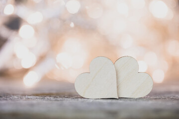 Two hearts on bokeh background - 568319638