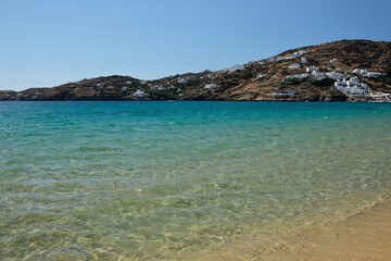 Fototapeta na wymiar Panoramic view of the popular and beautiful sandy beach of Mylopotas in Ios cyclades Greece