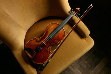 Violin musical instrument on the chair