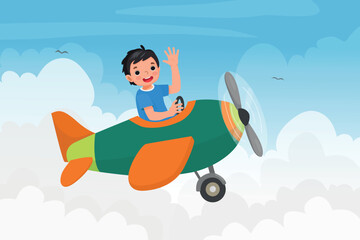 cute little boy flying an airplane waving hand in the blue sky