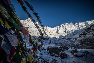 tibetan prayer flags with himalayan mountains