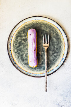 French dessert eclair with lavender