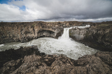 waterfall in iceland with bazalt columns