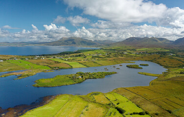 North east over Tully Lough to entrance to Killary Harbour and beyond to Mweelrea mountain. North Connemara, Ireland. Late summer