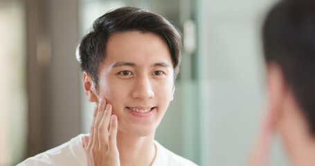 Asian man facial care