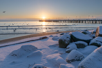 Winter on Baltic Sea in Gdynia, Poland:View at the sea and pier in Orlowo - obrazy, fototapety, plakaty