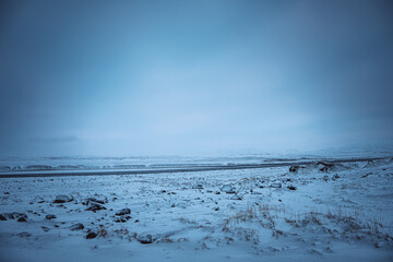 Iceland winter landscape with snow and clouds