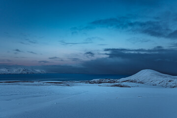 Iceland, Húsavík, winter panorama sunset