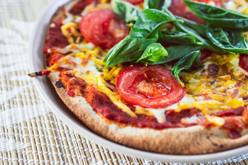 healthy plant-based food, vegan margherita pizza with fresh tomatoes and basil