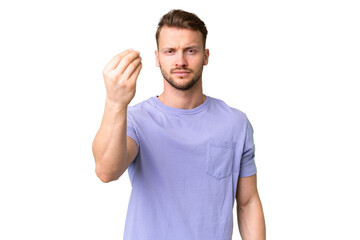 Young handsome caucasian man over isolated chroma key background making Italian gesture