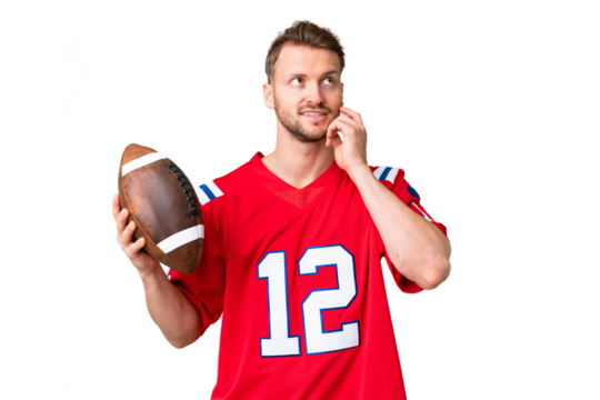 Young caucasian man playing rugby over isolated chroma key background thinking an idea while looking up