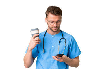 Young nurse man over isolated chroma key background holding coffee to take away and a mobile