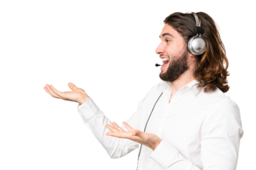 Telemarketer man working with a headset over isolated chroma key background with surprise facial expression