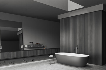 Fototapeta na wymiar Grey bathroom interior with washbasin and tub, accessories. Empty wall