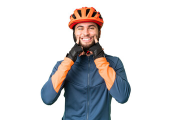 Young cyclist man over isolated chroma key background smiling with a happy and pleasant expression