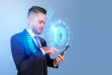 Businessman using phone, earth and cybersecurity hologram, shield with binary
