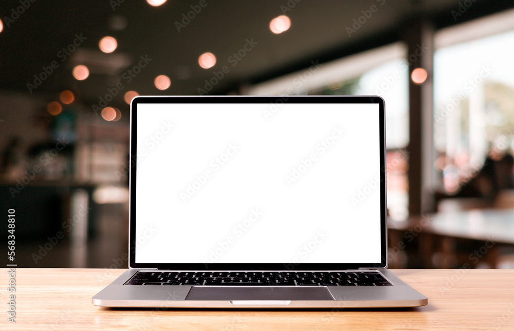 Fototapete laptop blank screen on wood table with coffee cafe background, mockup, template for your text, clipp