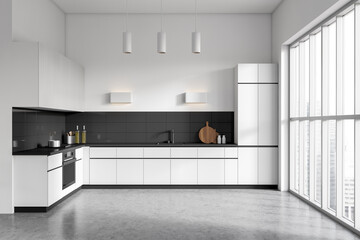 Front view on bright kitchen room interior with cupboard